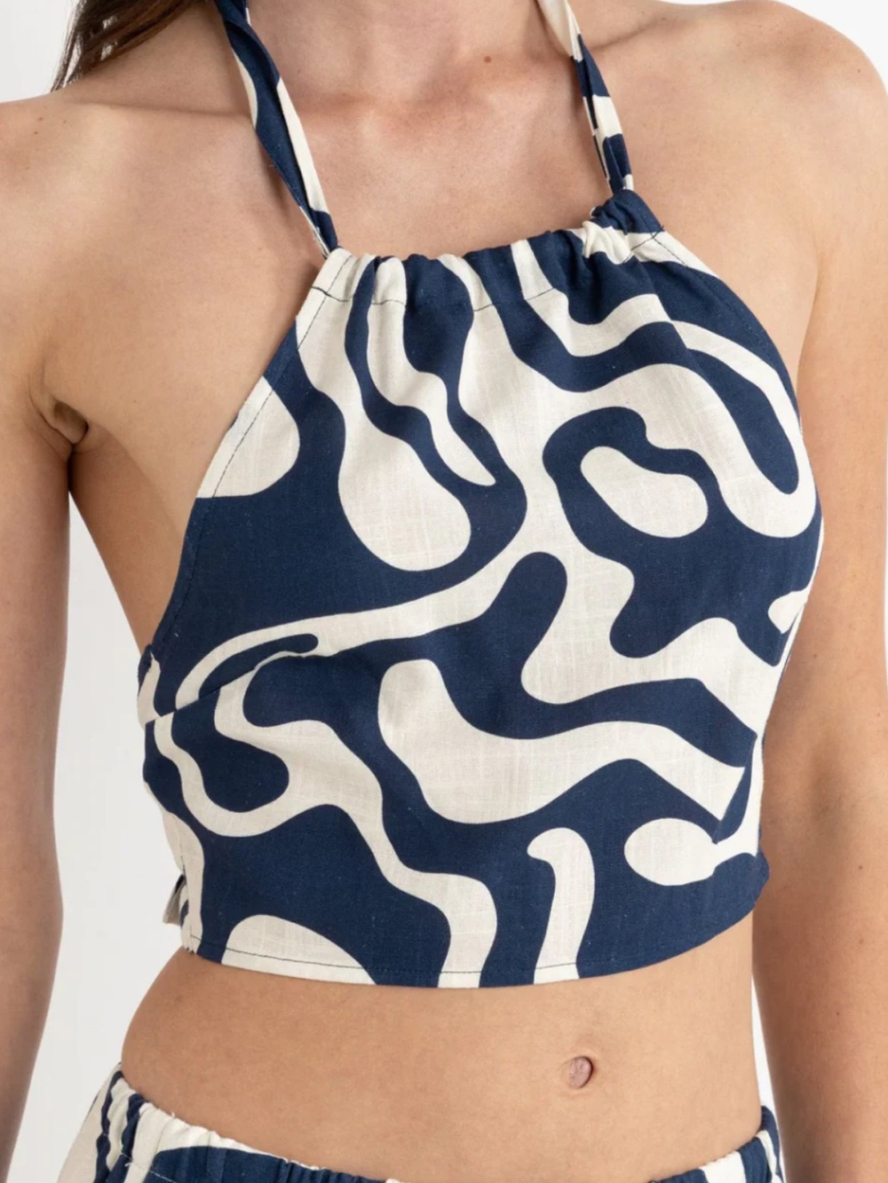 halter top open back in blue and white by Rhythm. Waverly